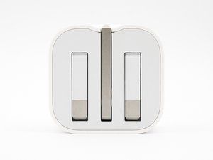 Apple 5W USB-toiteadapteri (kokkupandavad tihvtid - Ühendkuningriigi pistik) remont' alt=