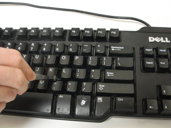 Sørg for, at dit tastatur er frakoblet, før du udfører et af disse trin.' alt=