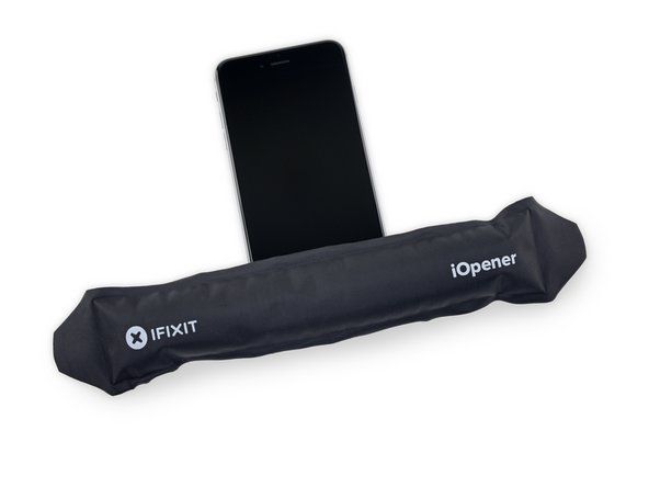 必要に応じて、iOpenerまたはヘアドライヤーを使用してiPhoneの下端に約1分間穏やかな熱を加えます。' alt=