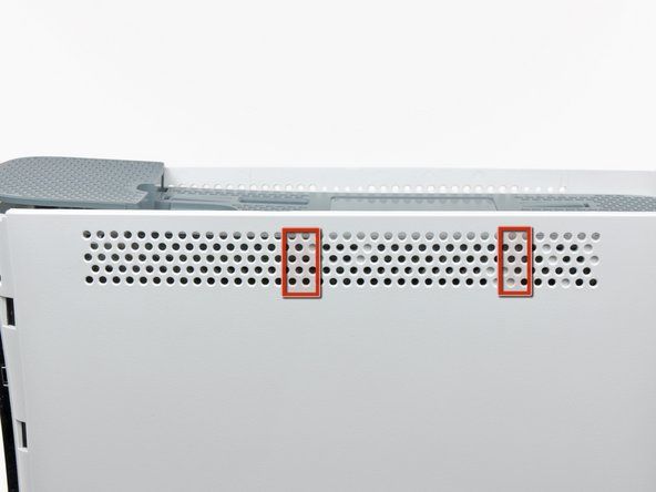 Trong vài bước tiếp theo, bạn sẽ sử dụng đầu của một spudger hoặc ngón tay của công cụ mở Xbox 360 để thả các clip dọc theo bên trái và bên phải của lỗ thông hơi trên cùng. Vị trí của họ được đánh dấu bằng màu đỏ.' alt=