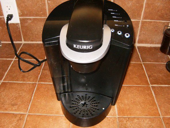 Jak otevřít a vyčistit kávovar Keurig' alt=