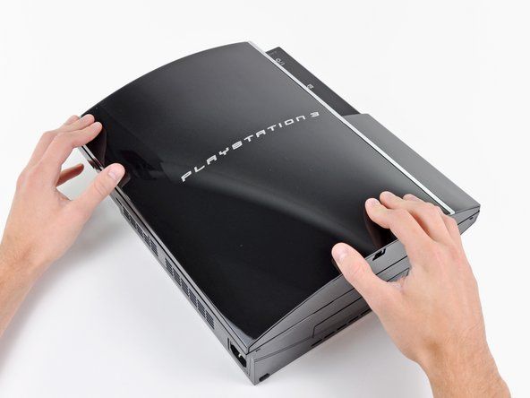 Τραβήξτε την έξυπνη πλάκα προς την υποδοχή του σκληρού δίσκου και, στη συνέχεια, σηκώστε την από το σώμα του PS3.' alt=