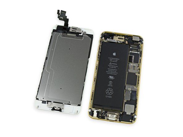 ディスプレイアセンブリを取り外した状態で、iPhone 6Plusの内部を最初に確認します。' alt=